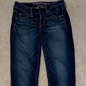Woman's American Eagle Super Stretch Skinny 26x28 Dark Blue Jeans